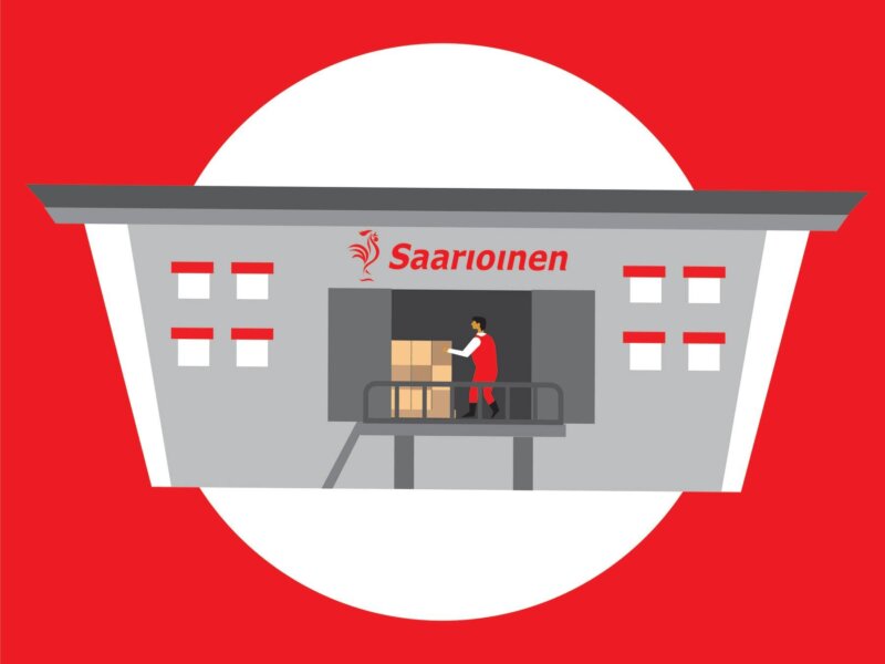 Kuvassa on laatikoita, joita henkilö kuljettaa.